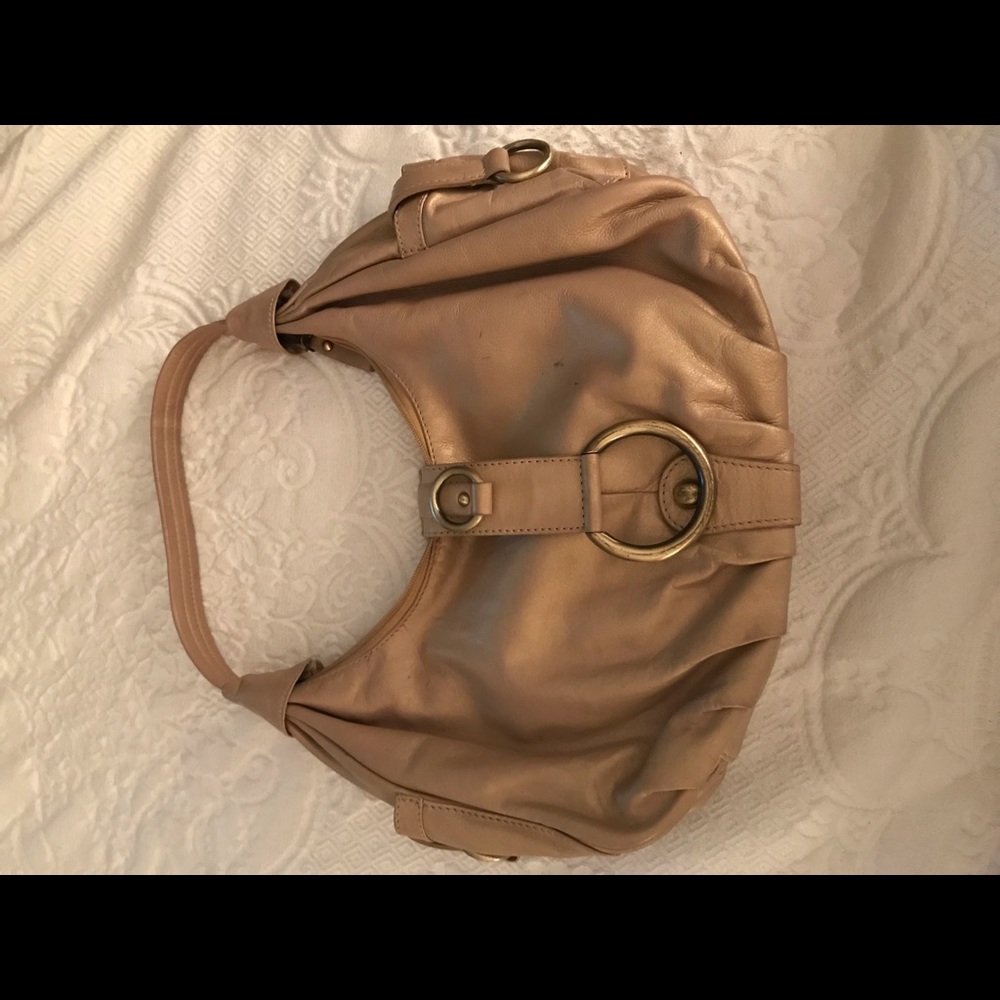 Nice used purse!  Lots of wear left in this bag!